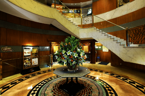 A luxurious hotel lobby with beautiful flowers