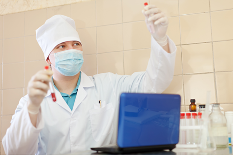 Researcher worker with test tubes