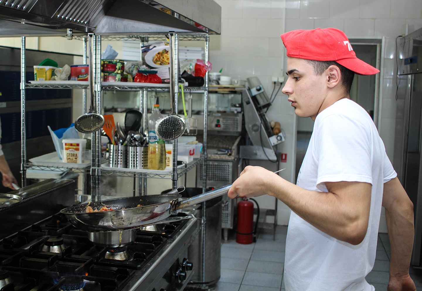 male kitchen staff cooking