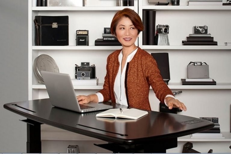Moving Desk Encourages Ofice Exercise and Improves Productivity Alsco